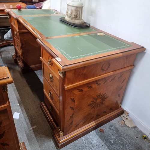 688 - Star Lot : A monumental large Directors desk featuring a green tooled leather top in three parts, wi... 