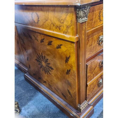 684 - Star Lot : A monumental large directors desk featuring a tooled leather top in three parts, with fou... 