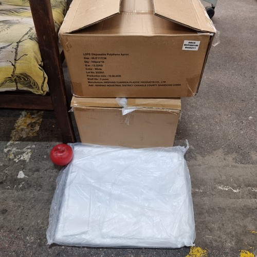 621 - A PPE lot consisting of two boxes full of LDPE disposable polythene aprons in white. Includes 100 ap... 