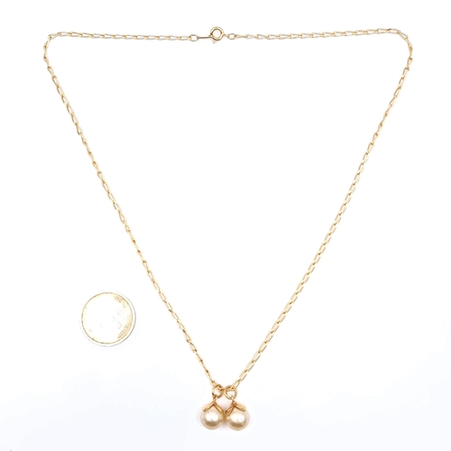 864 - A gold plated twin pearl necklace with 10K stamped to clasp, length of chain 48cm, boxed. Old new st... 