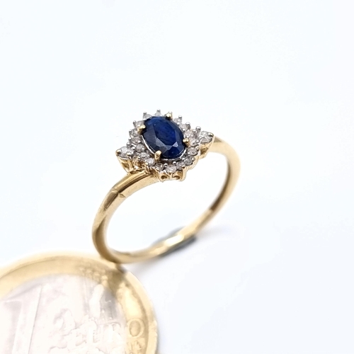 865 - Star Lot : A vintage very pretty 9k gold diamond and sapphire ring hallmarked Birmingham, diamond st... 