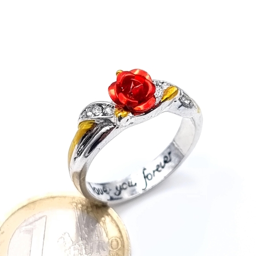 867 - A pretty rose set ring with twist gem stone mount inner band Inscribed 