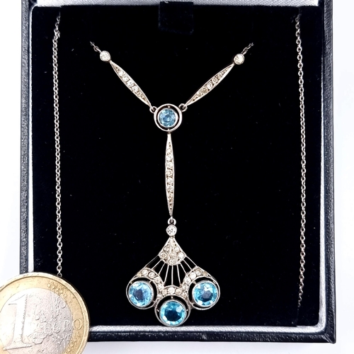 868 - An attractive vintage sterling silver necklace in the Egyptian style set with Aquamarine stones toge... 