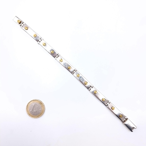 871 - A vintage art deco sterling silver bracelet with gold screw accents, weight 38.5 grams, boxed.