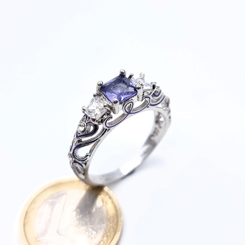 876 - An outstanding amethyst and gemstone ring with hallmarks for silver, size S, weight 4.45 grams, boxe... 