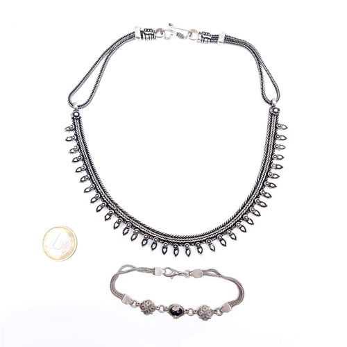 880 - A rare Victorian style  steel cut necklace with rope twist suspension together with an associated br... 