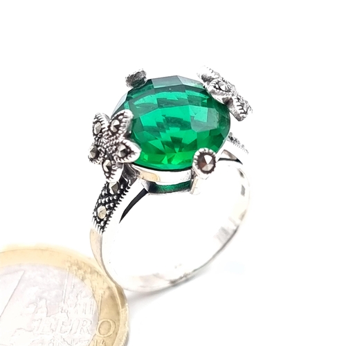 881 - a green tourmaline sterling stone ring with gem set marcasite mount, ring size S, weight 5 grams, bo... 