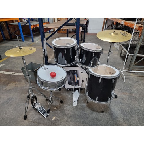 385 - Star Lot: A high quality drum set including five drums from Music Store Pro Drumline in varying size... 