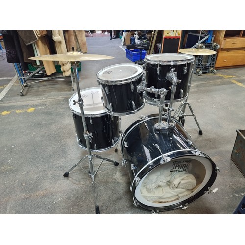 385 - Star Lot: A high quality drum set including five drums from Music Store Pro Drumline in varying size... 