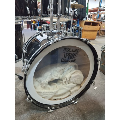 385 - Star Lot: A high quality drum set including five drums from Music Store Pro Drumline in varying size... 