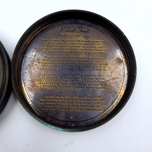 47 - An antique marine compass set with screw top lid and Robert Frost, The road less travelled poem insi... 