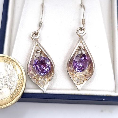 51 - A pair of silver amethyst stone pendant earrings suitable for pierced ears, boxed.