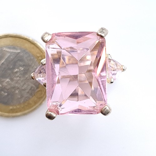 451 - A sterling silver huge pink gemstone ring, ring size P, weight 9.58 grams, boxed.