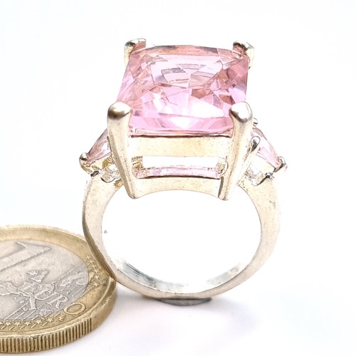 451 - A sterling silver huge pink gemstone ring, ring size P, weight 9.58 grams, boxed.