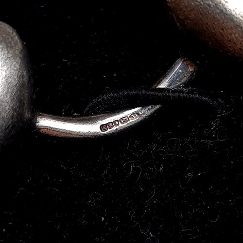 454 - A pair of sterling silver hallmarked bean designed cufflinks, total weight 10.26 grams, boxed.