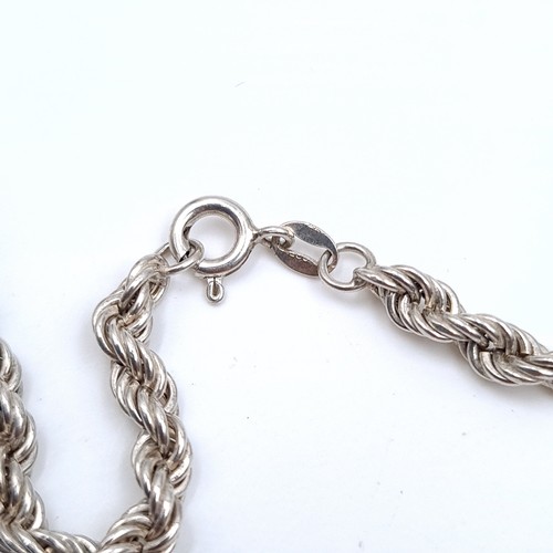 469 - A twist link sterling silver necklace, length 48cm, weight 13.1 grams, boxed.