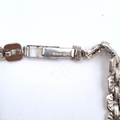 472 - A square link sterling silver bracelet, weight 15.6 grams, boxed.