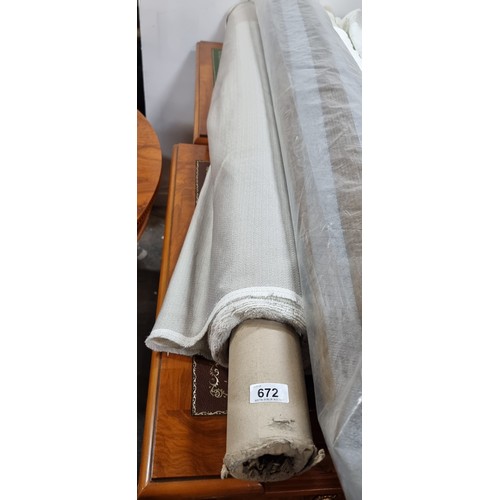 672 - A large bolt of cream synthetic fabric with slight elastic give and a satin side. Lots of value here... 