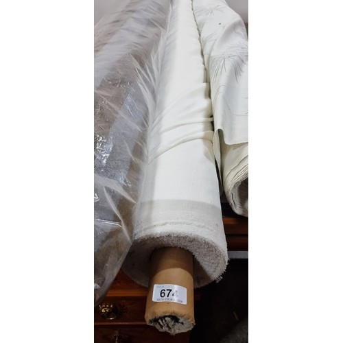 674 - A large bolt of high quality fabric in a fresh white muslin weave.