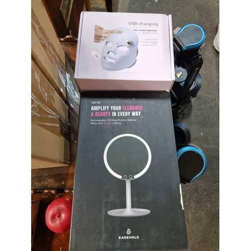 908 - Two items including a USB charging beauty LED mask. Along with a Tara Pro Easehold light-up vanity m... 