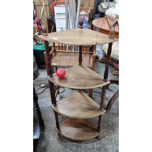 665 - An elegant corner shelving unit with four shelves and lovely turned supports. From Montobello House ... 