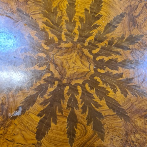 689 - Star Lot : A stunning and large Satinwood  round table with string inlay, marquetry and parquetry to... 