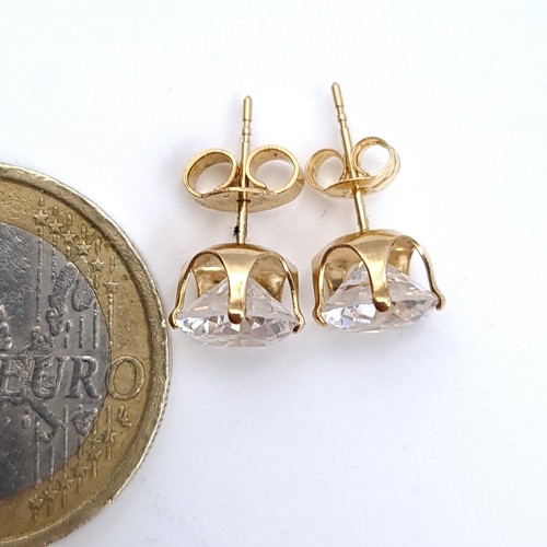 485 - A pair of 9K gold gem stone stud earrings, total weight 1.43 grams.