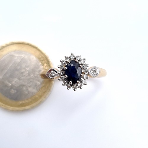 489 - Star Lot : A very pretty example of a 9K gold (375) diamond and sapphire ring, size N, weight 2.4 gr... 