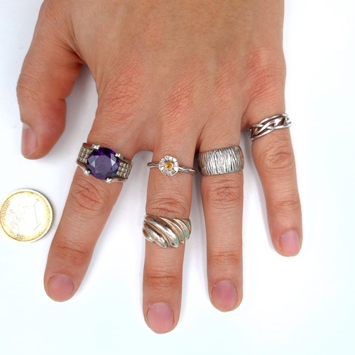 494 - A collection of five sterling rings, one with attractive amethyst setting, ring sizes J, L, M x2 and... 