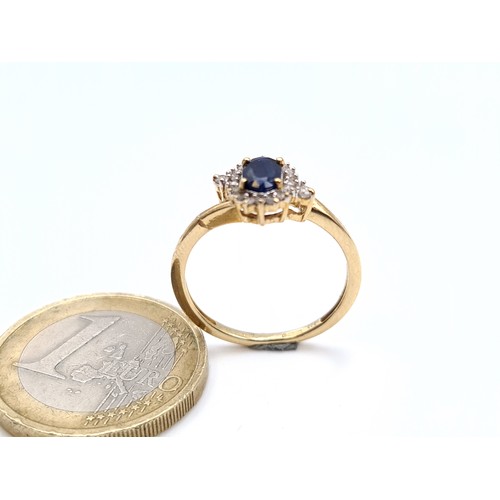 865 - Star Lot : A vintage very pretty 9k gold diamond and sapphire ring hallmarked Birmingham, diamond st... 