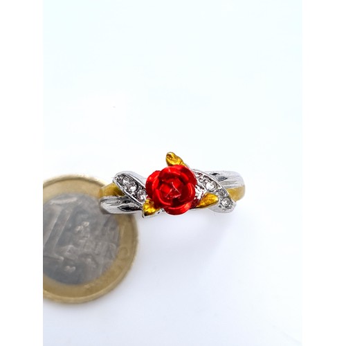 867 - A pretty rose set ring with twist gem stone mount inner band Inscribed 