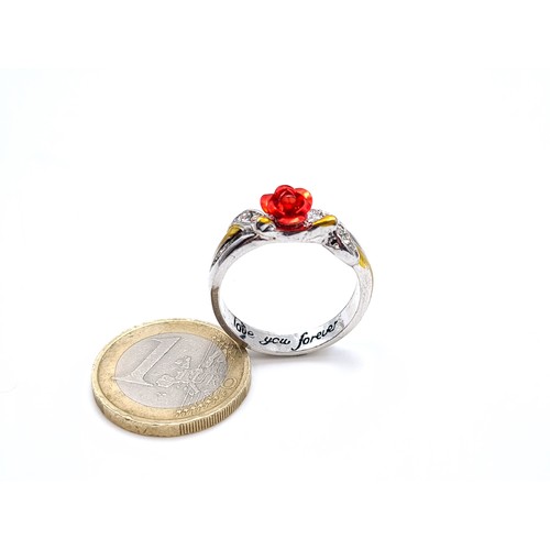 867 - A pretty rose set ring with twist gem stone mount inner band Inscribed 