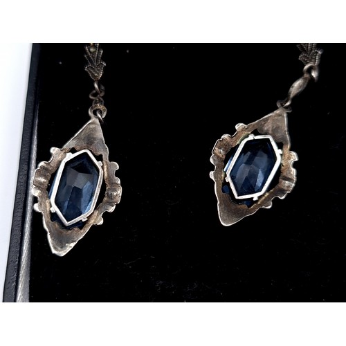 879 - A vintage art deco pair of blue topaz drop earrings with marcasite chain detailing, length 4.5cm, su... 