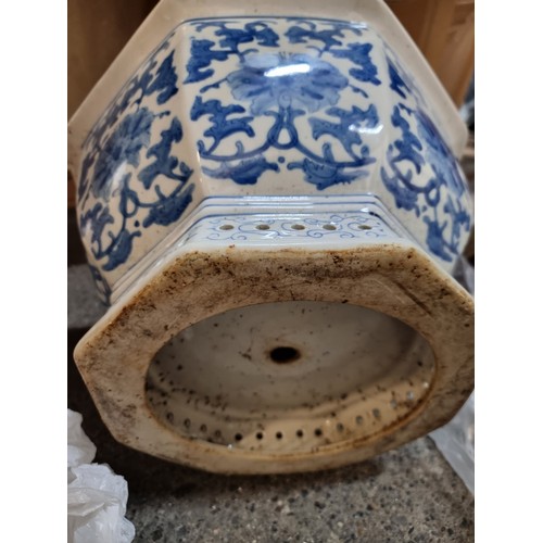 839 - A gorgeous large and heavy vintage ceramic octagonal planter decorated in a floral blue and white gl... 