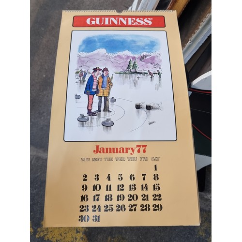 120 - A super retro Guinness branded wall calendar dating to 1977 featuring comical illustrations by T. Gr... 