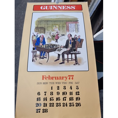 120 - A super retro Guinness branded wall calendar dating to 1977 featuring comical illustrations by T. Gr... 