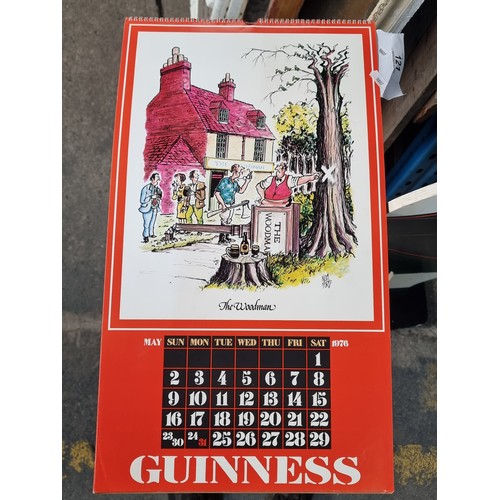 121 - A super retro Guinness branded wall calendar dating to 1976 featuring comical illustrations by Noel ... 