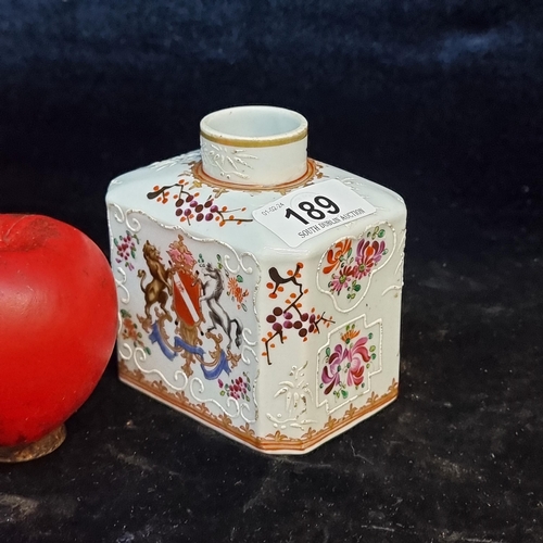 189 - A pretty antique Chinese armorial tea caddy featuring moriage and floral design.