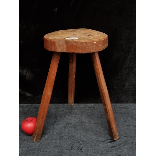 203 - A charming early 20th Century stained oak milking stool.