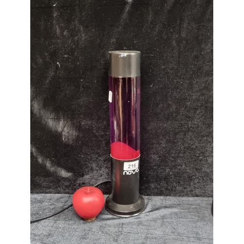 216 - A funky tall Nova branded lava lamp. Fully working, turns the room red and purple