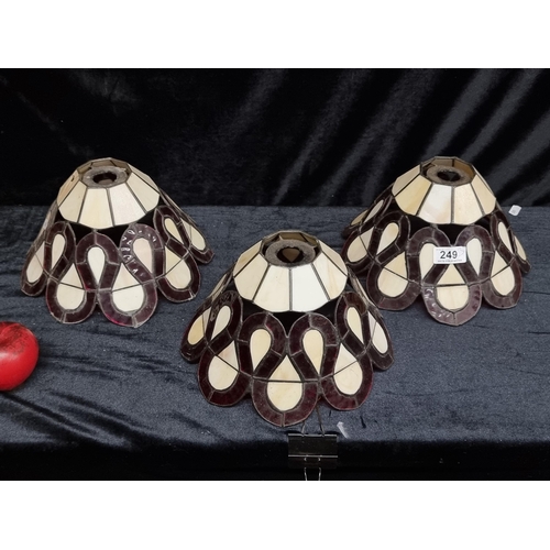 249 - Three matching vintage Tiffany style ceiling glass shades in red and cream. Slight loss to some pane... 