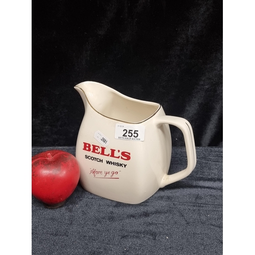 255 - A fabulous vintage Wade Bells Scotch Whisky jug. In very good condition.