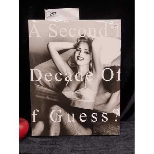 257 - A very large hardback book titled 'A Second Decade of Guess' by Paul Marciano. With original dust ja... 