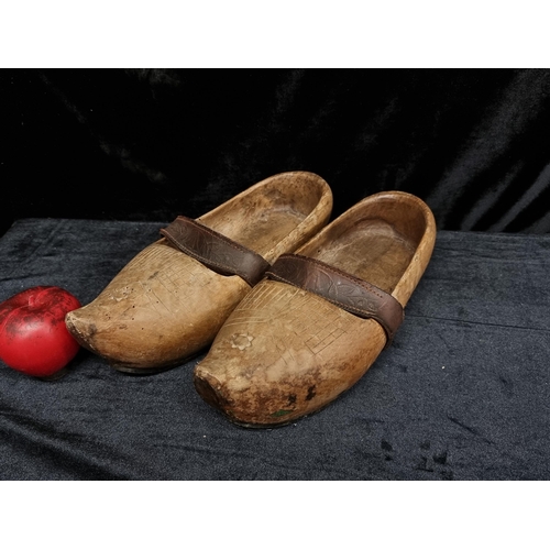 260 - A fantastic pair of antique French clog shoes crafted from wood with genuine leather straps and sole... 