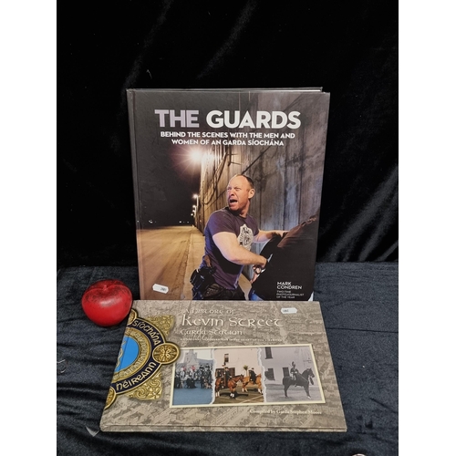 262 - Two hardback books of Irish Garda interest including 'The Guards' by Mark Condren and 'A History of ... 