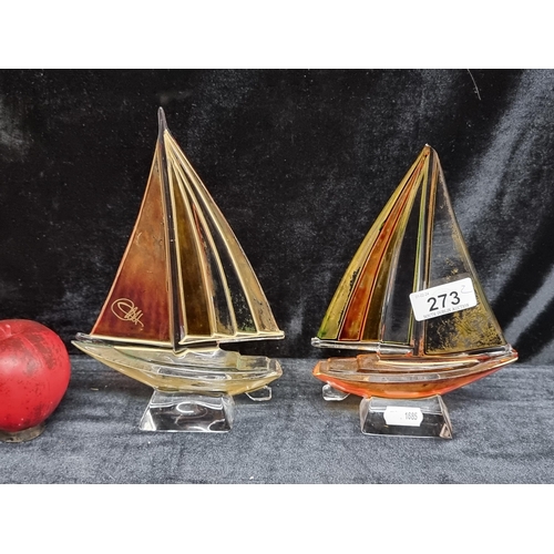 273 - A stunning pair of Murano hand painted and signed glass sailboat sculptures. Small loss to the tip o... 