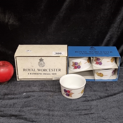 300 - A set of four Royal Worcester fine porcelain ramekins in the Evesham series. In original box.