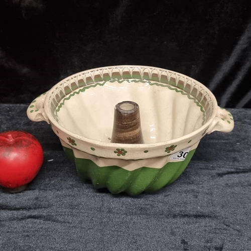 302 - A charming French Kouglof / Bundt cake dish with hand painted daisy pattern edge. Really like this.