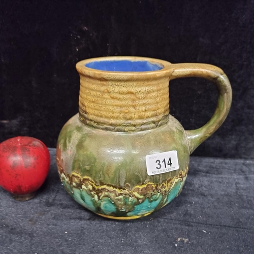 314 - A super vintage stoneware studio art pottery lava jug / pitcher.