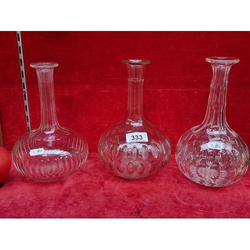 333 - Three stylish handblown glass decanters with pontil marks. In very good condition.